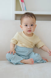 Baby wearing soft mint ribbed pants – Avauma